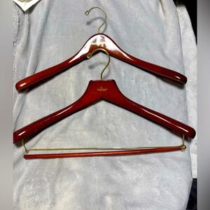 Set off 2 Paul Stuart Red Wooden Hangers